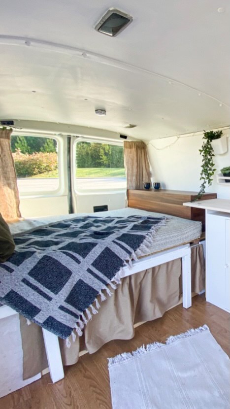 Plaid Camper Bed With Earthy Accents