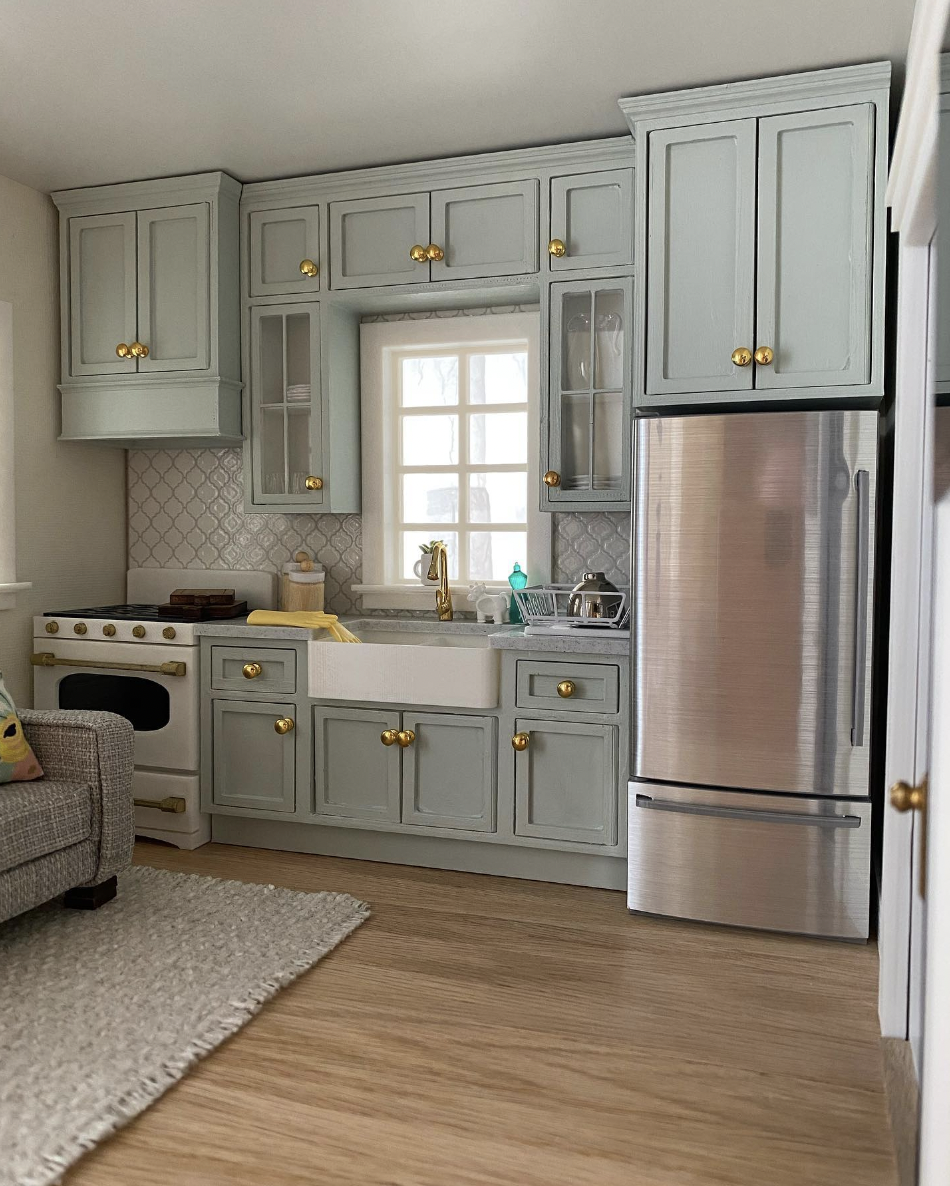 Compact Sage Green Cabinet Over the Refrigerator