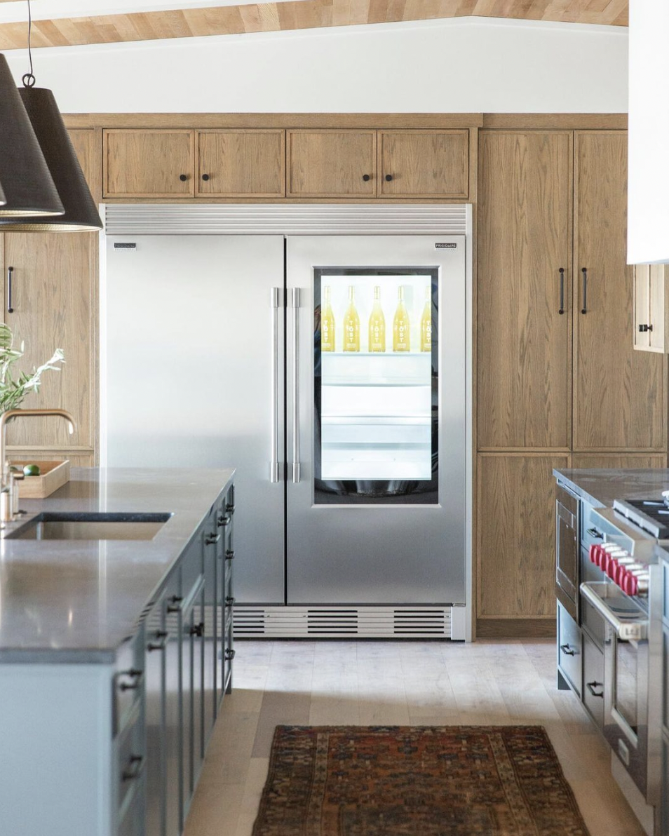 Wood Cabinet Ideas for Above-Fridge Storage with Black Hardware