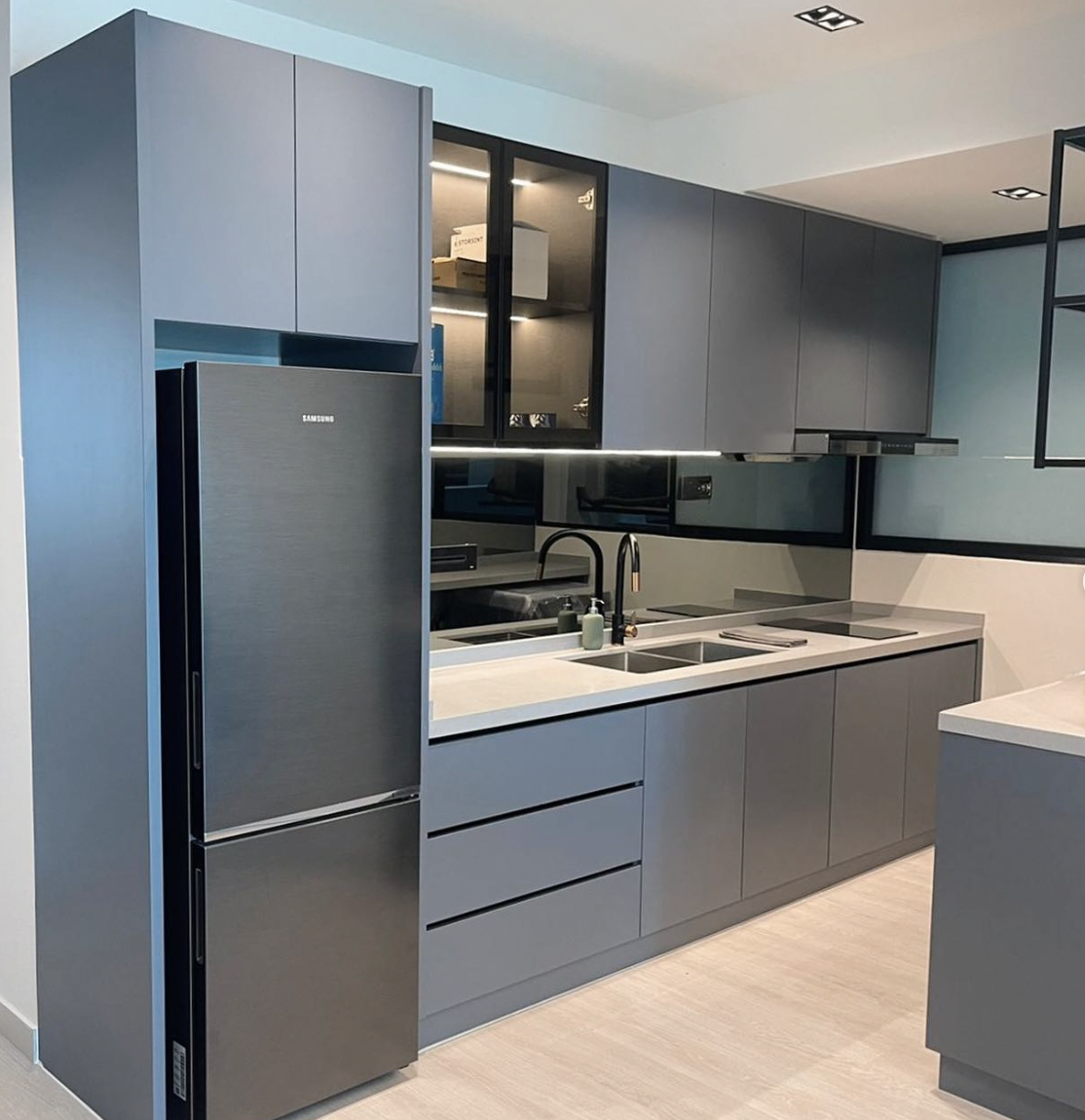 Blue Cabinetry and a White Countertop