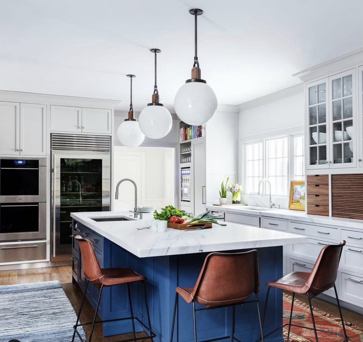 Stainless Steel Appliances with Off-White Cabinets