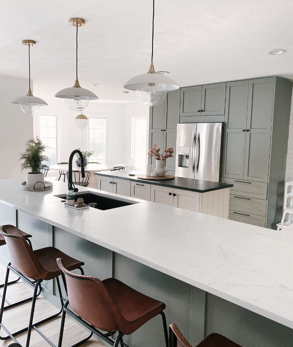 Small Kitchen With Sage Green Cabinets and Black Hardware