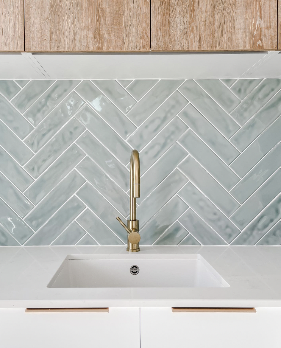Two-Tone Kitchen in White and Wood With a Grey Backsplash
