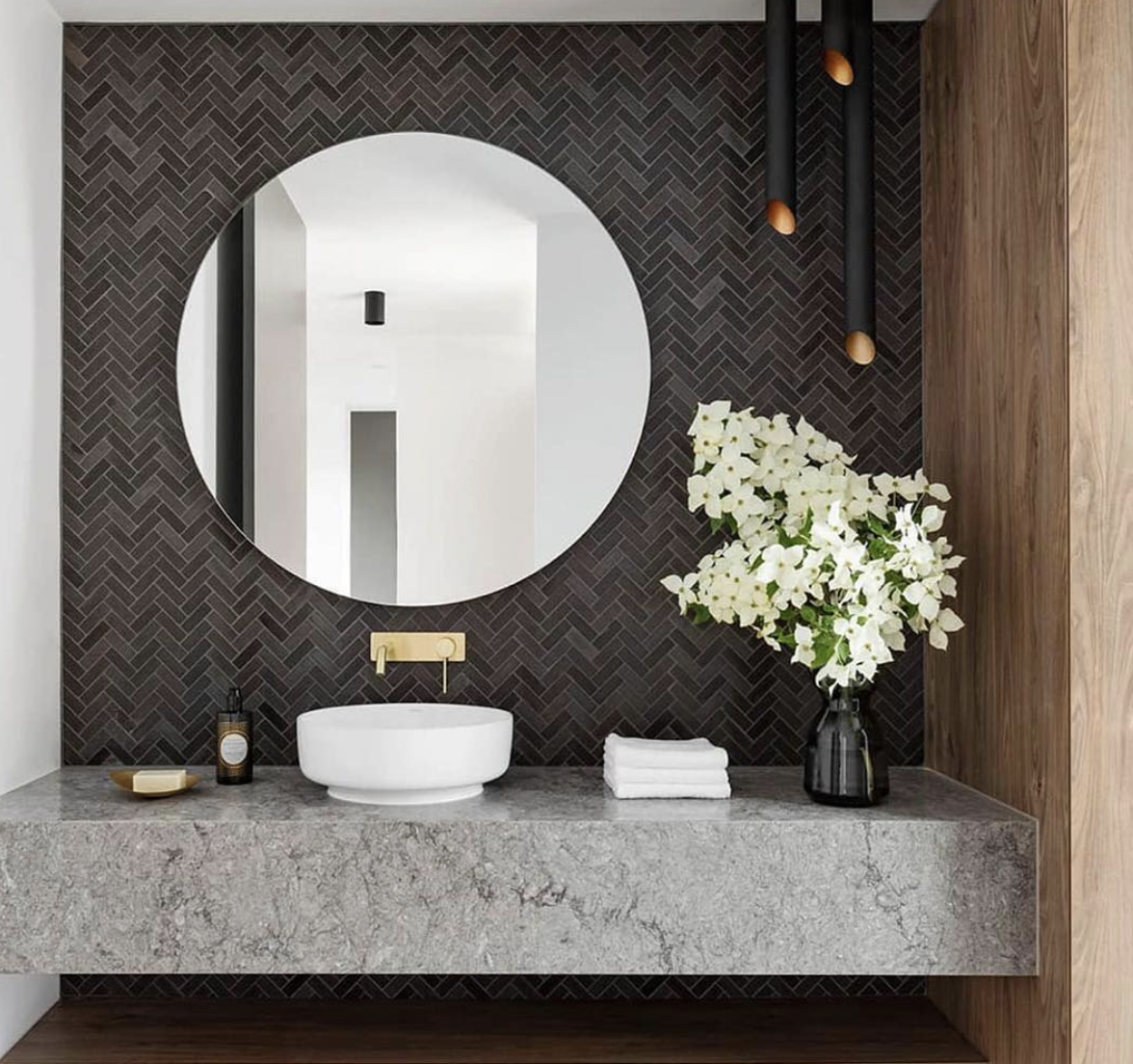 Dark Brown Wood Backsplash in a Herringbone Layout for the Sink Area