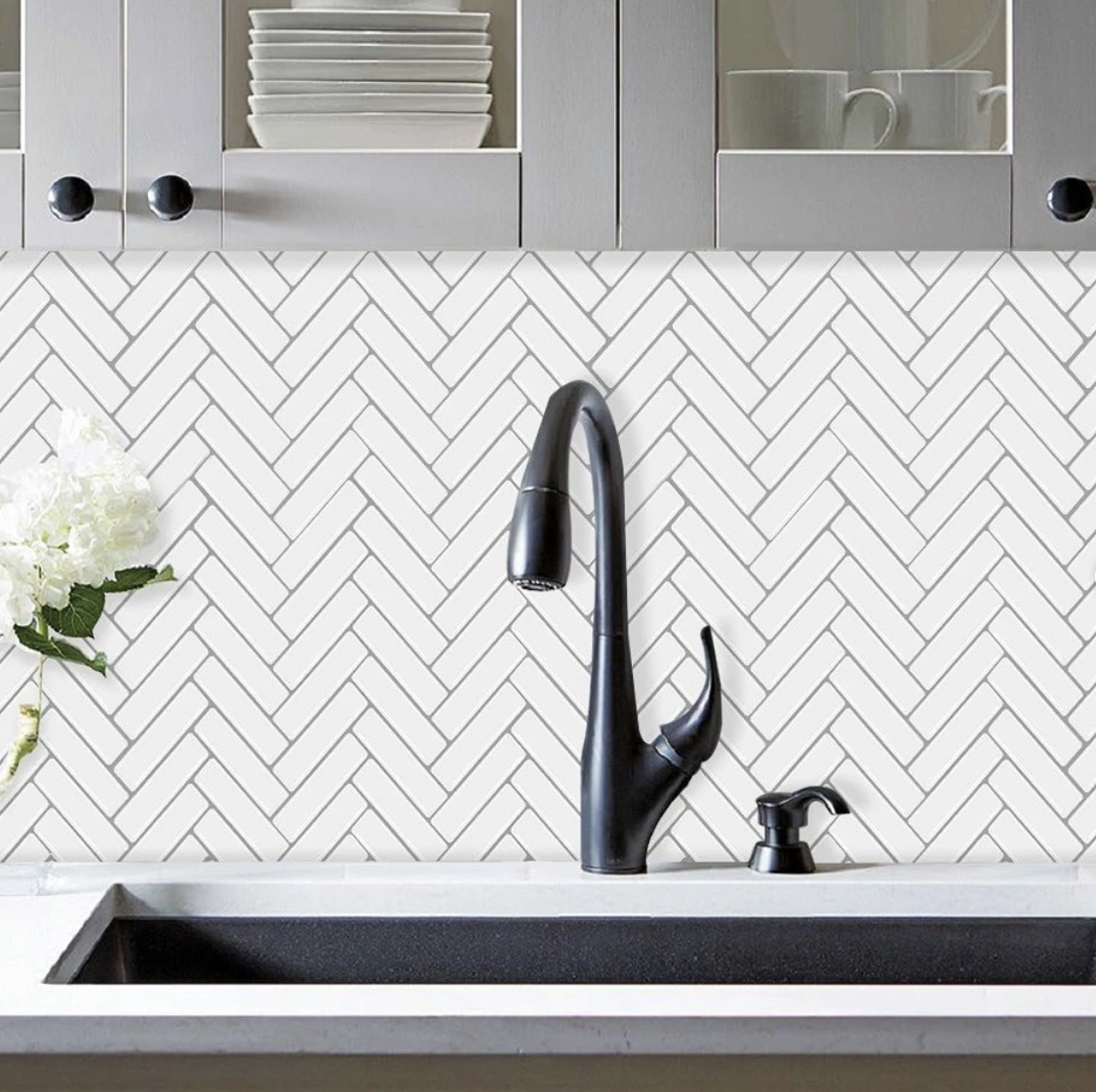 White Herringbone Backsplash, Grey Grout, Grey Cabinets And Black Hardware
