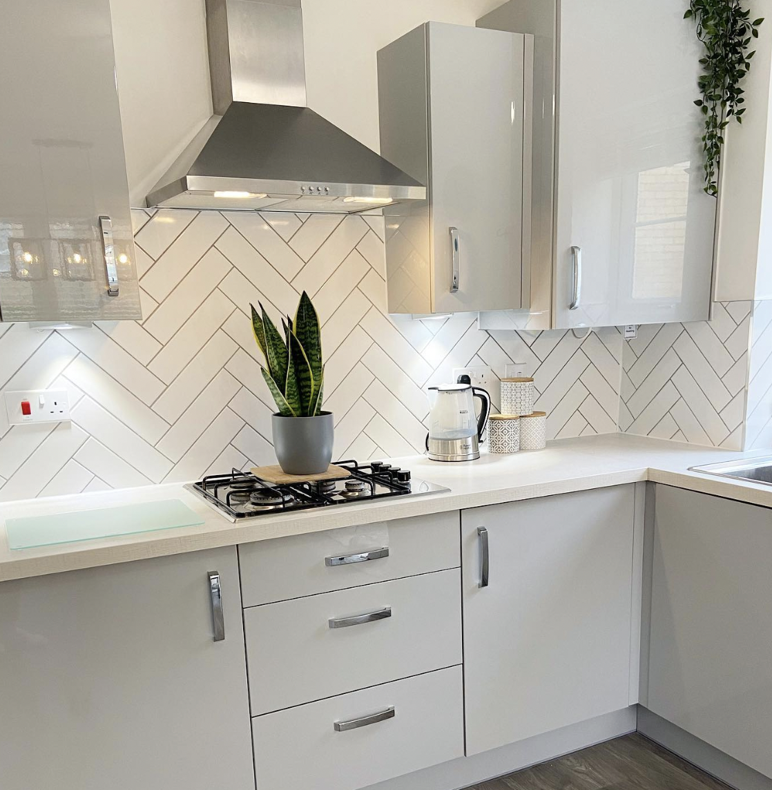 Light Grey Kitchen Accented by Silver Hardware
