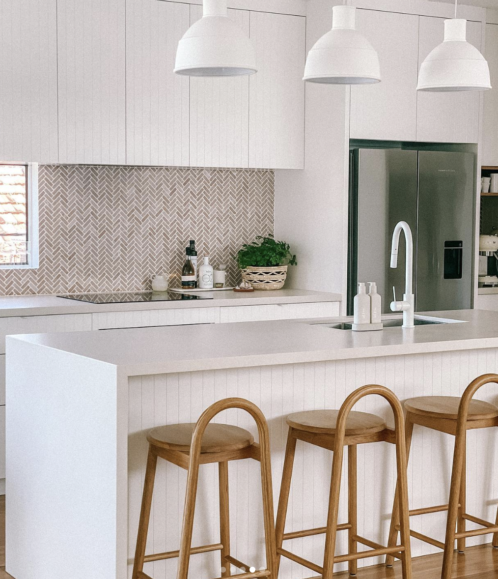 Herringbone Backsplash in Small Brown Tiles