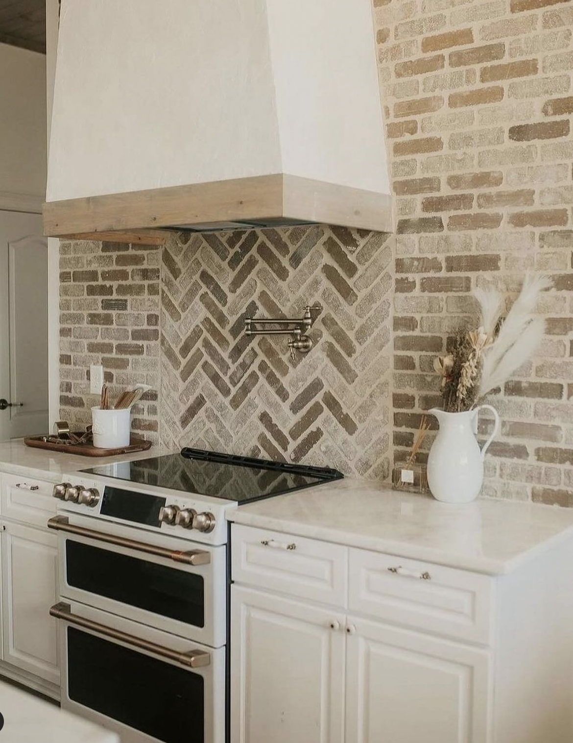 White-Grouted Brick Accent Wall in the Kitchen