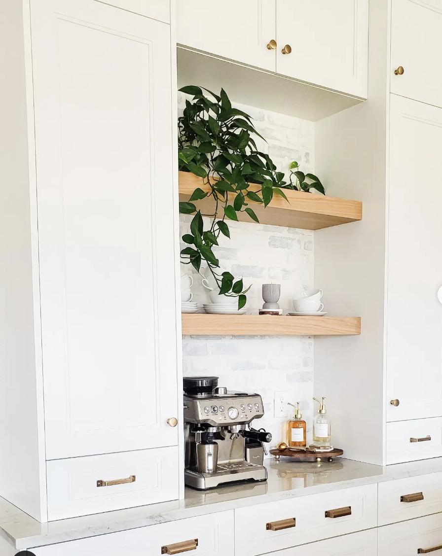 Whitewashed Brick Backsplash With Built-In Cabinetry