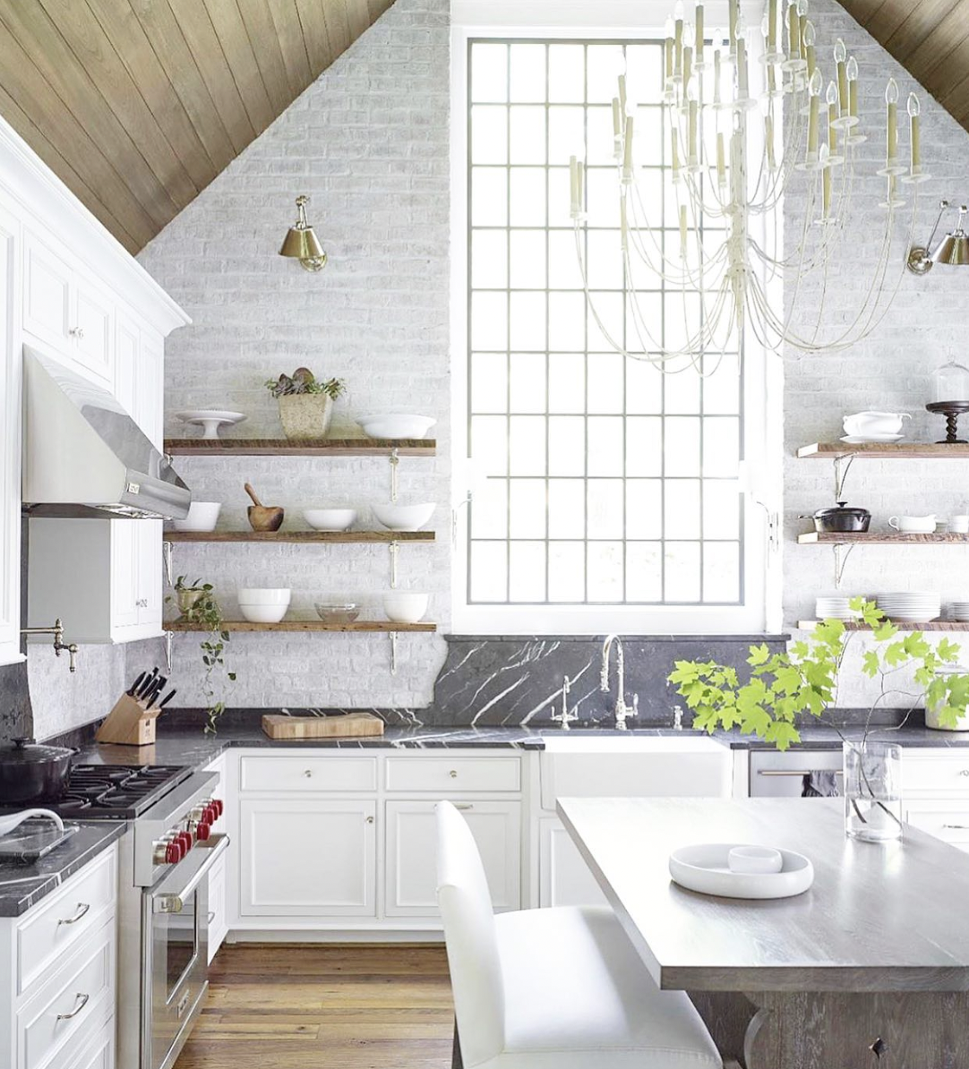 Farmhouse Kitchen Featuring a White Brick Accent Wall