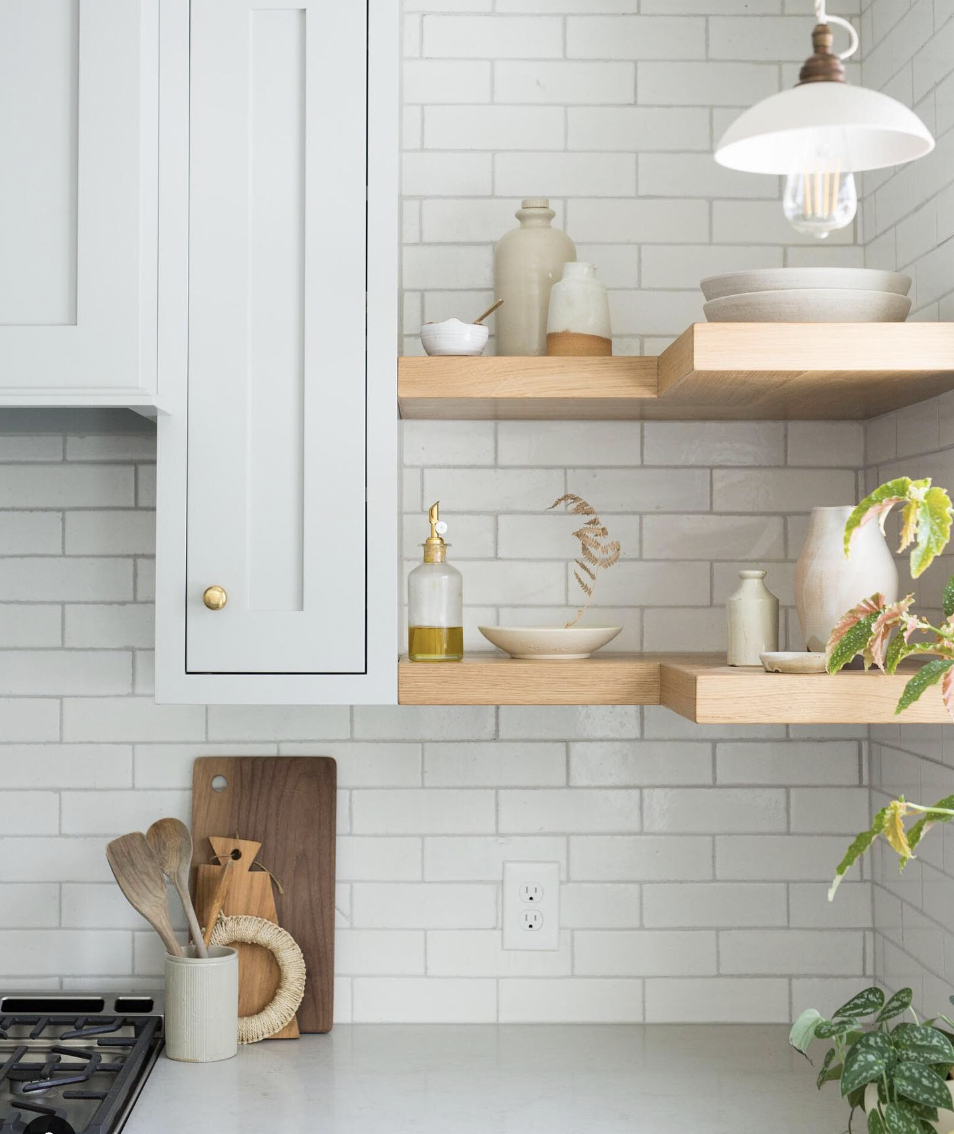 Grey Kitchen Brick Backsplash With L-Shaped Shelves In The Corner