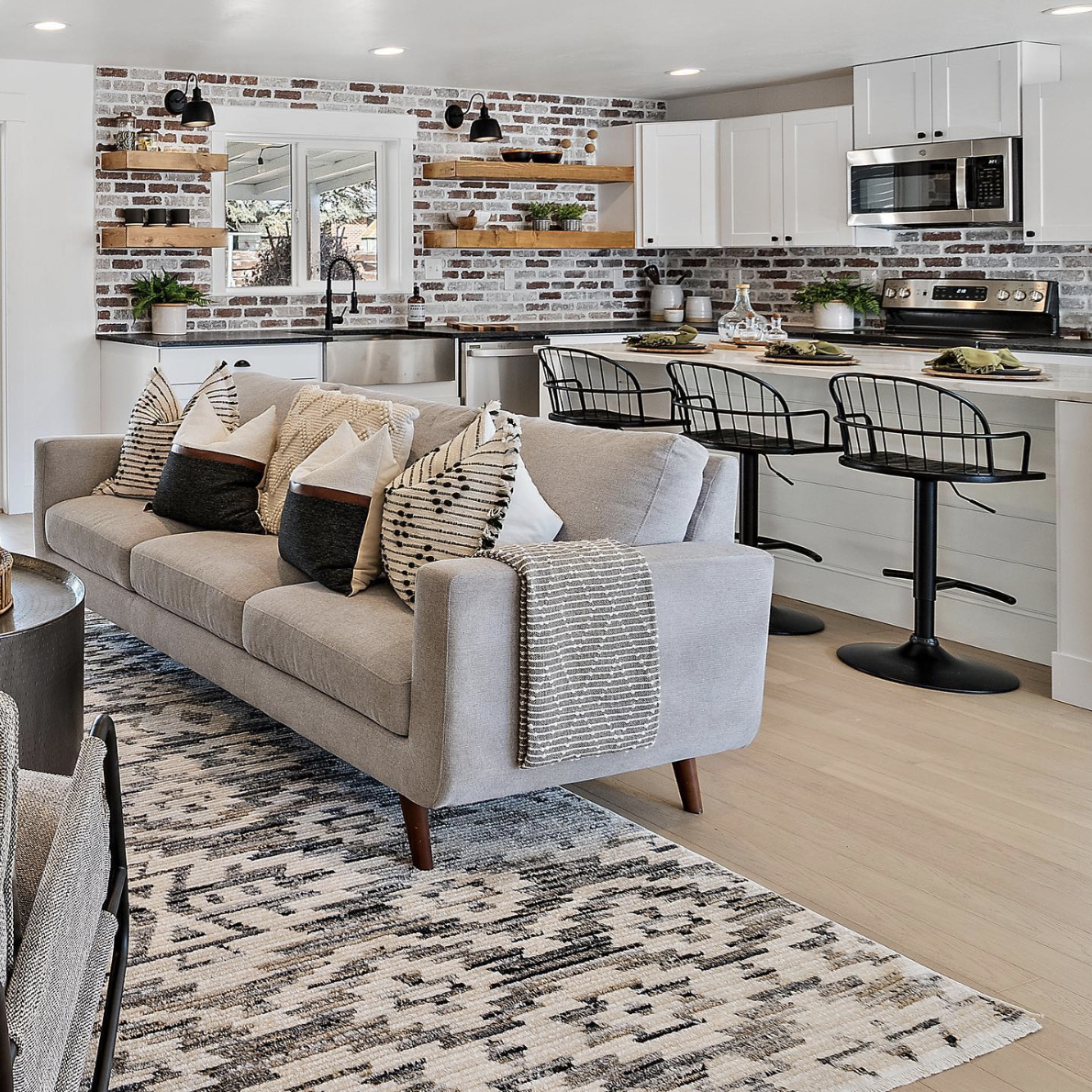 Ideas for an Open Kitchen Featuring a Red Brick Backsplash