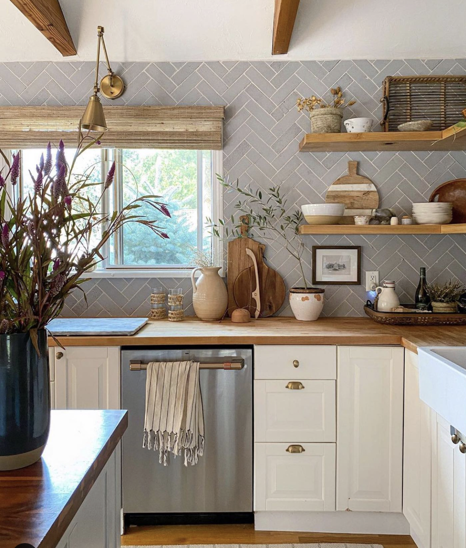 Gray Brick Backsplash in a Herringbone Layout