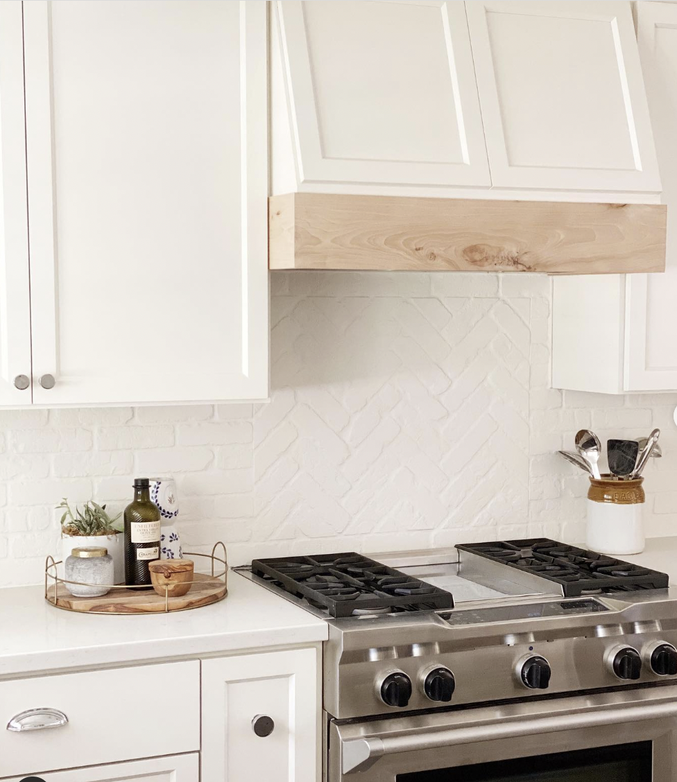 White Cabinets and Brick Walls