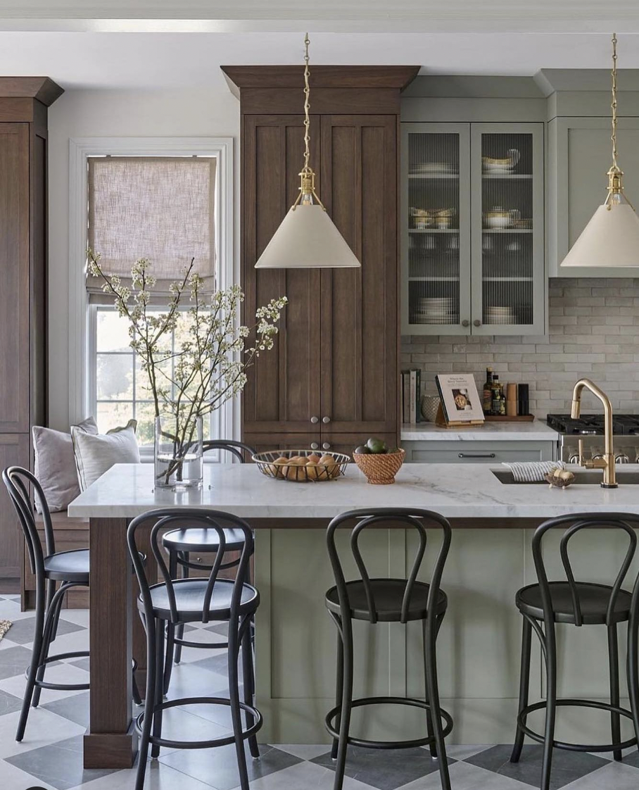 Two-Tone Sage Green And Dark Wood Cabinets With Crown Molding