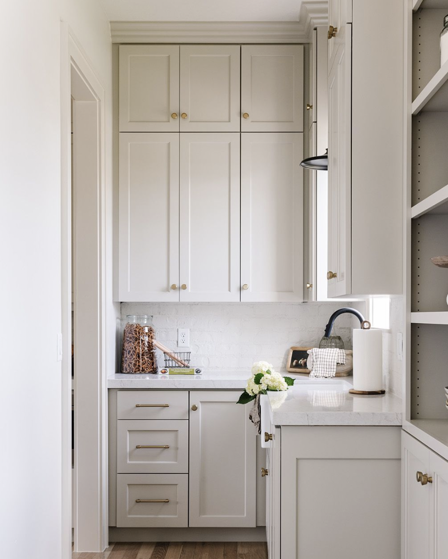 Neutral Cabinets With Trim for the Pantry