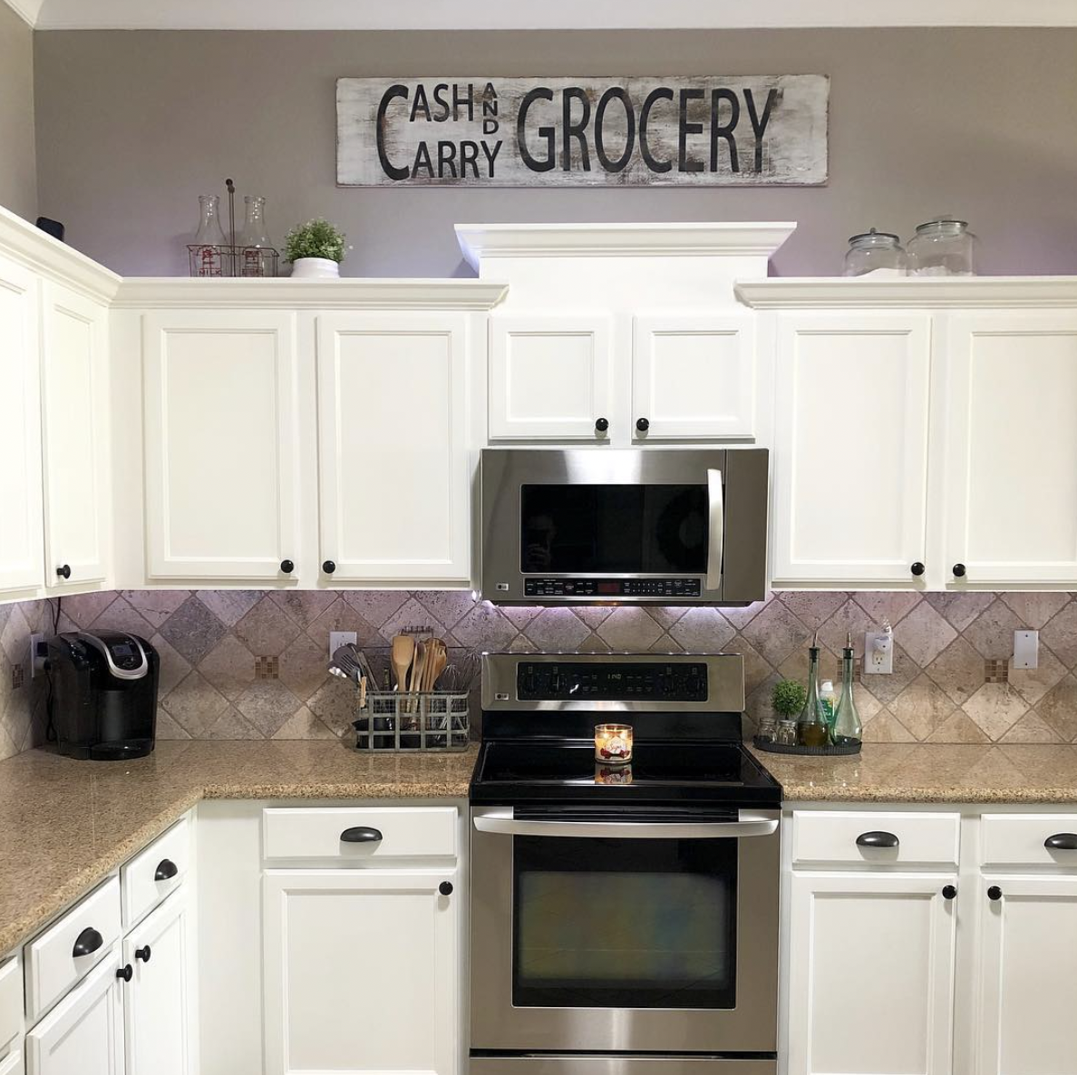 White Crown-Molded Cabinets in a Farmhouse Kitchen
