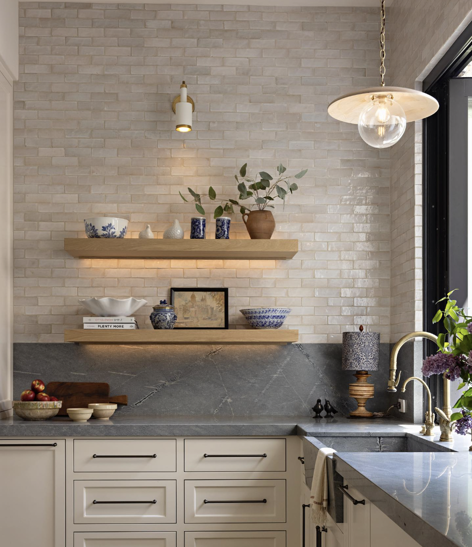 Kitchen Sink Light Fixture with a Gold Faucet