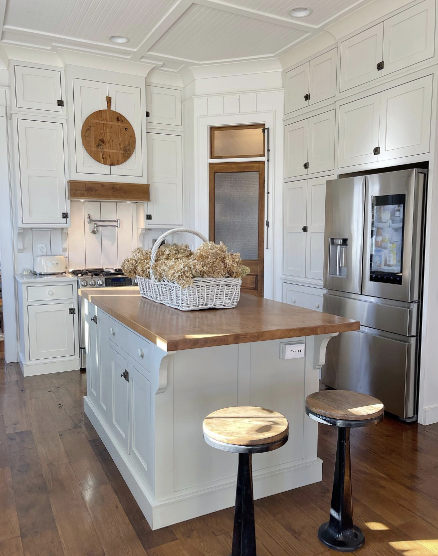 White-Cabinet Kitchen with Wood Flooring
