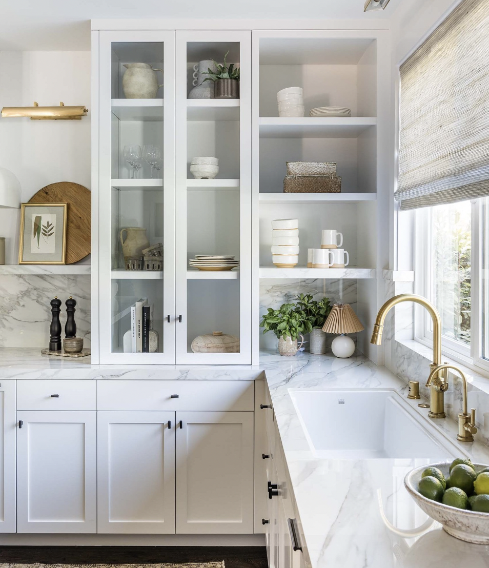 White Cabinets Above The Counter With Glass Doors