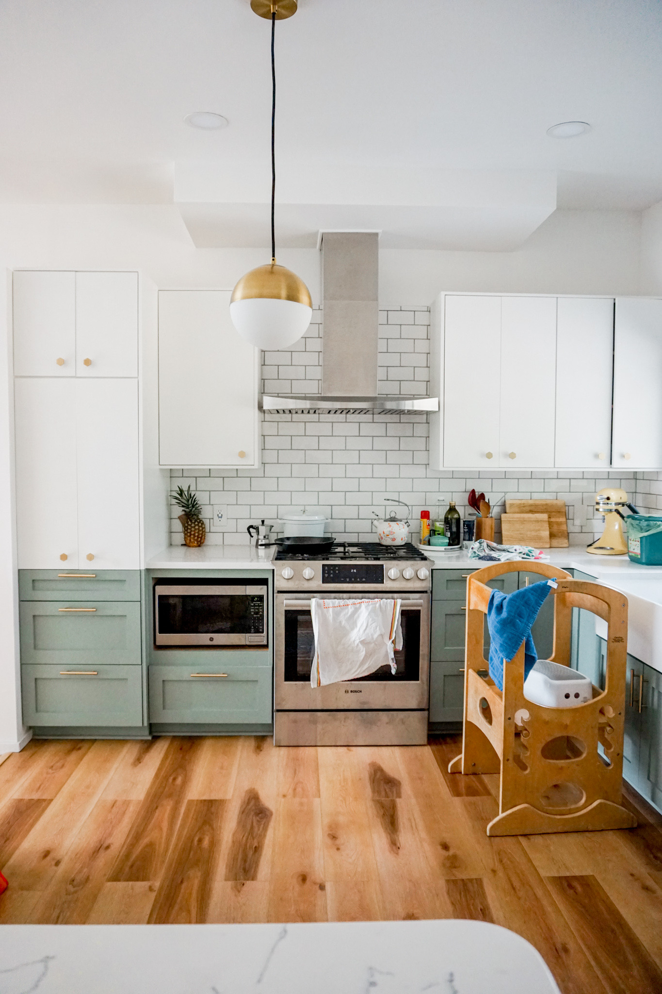 Two-Tone Kitchen Renovation With Mid-Century Style