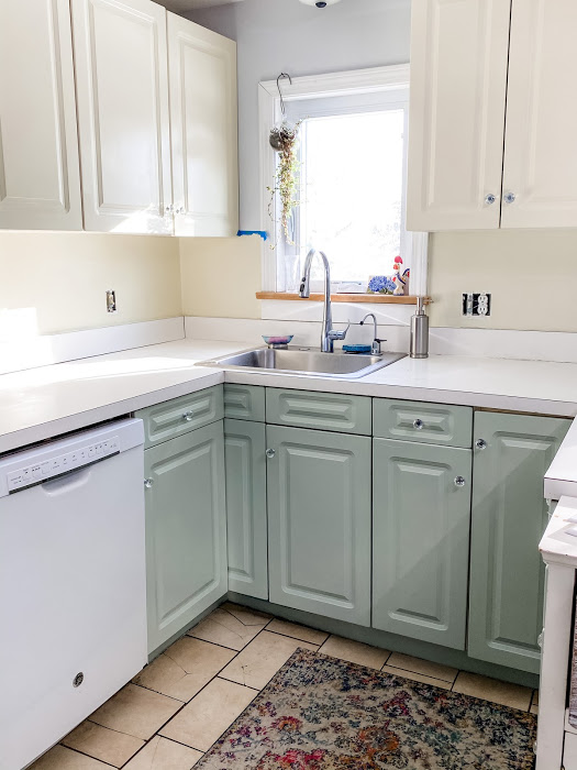 White and Pale Green Kitchen Cabinets